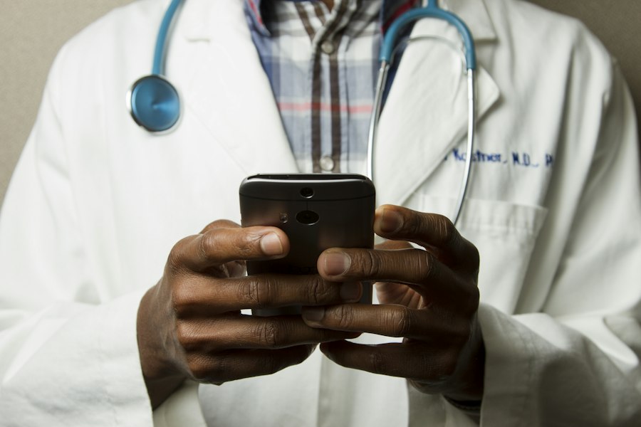 Healthcare professional holding a smartphone