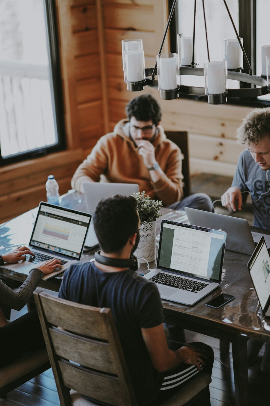 Colleagues collaborating in a bright shared workspace